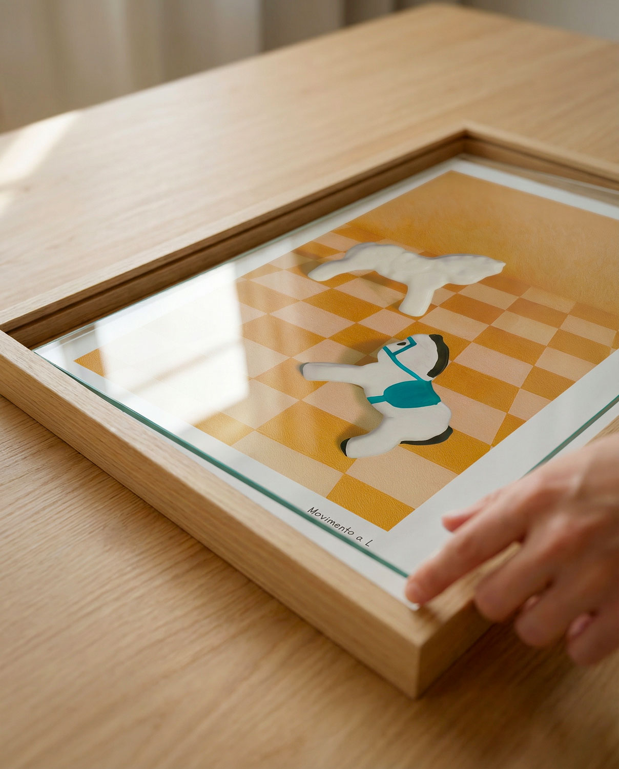 Come appendere un quadro senza ganci?